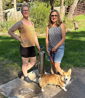 Cr Cutts with resident Thea and her dog