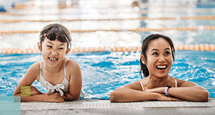 Mum and daughter in pool