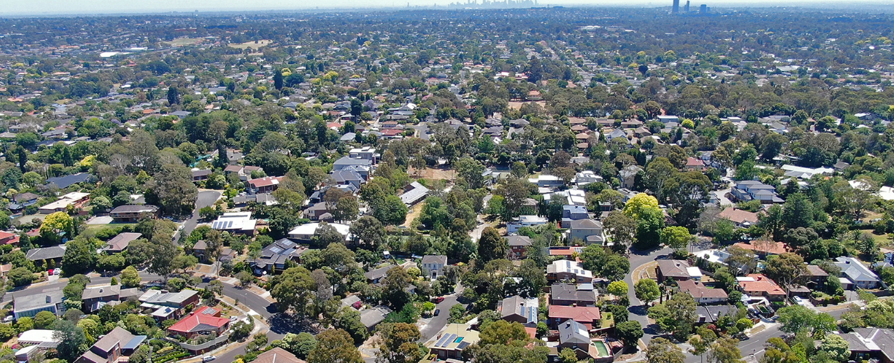 Aerial view of Melbourne with city skyline on horizon