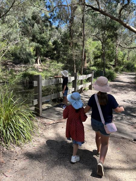 Children walking across bridge at Yarran Dheran