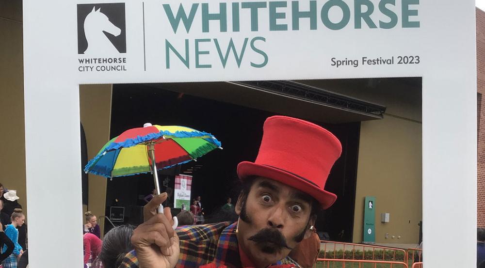Whitehorse News roving frame with magician