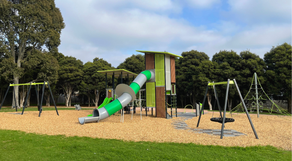 playspace with green and grey slide