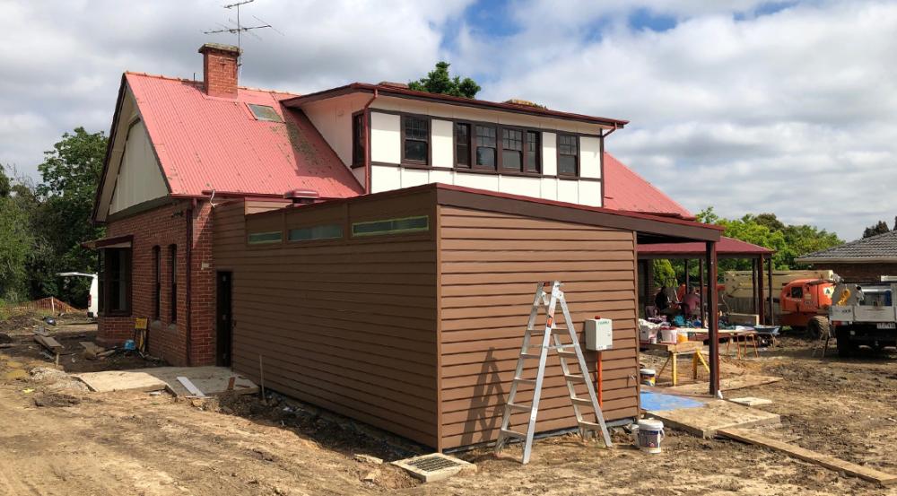 South rear of house showing new painting on top level, new toilet block and rear verandah