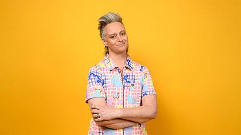 Geraldine Hickey standing with arms crossed