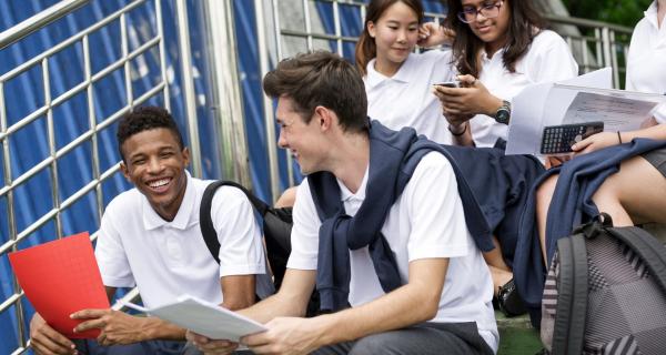 Secondary School students socialising at school