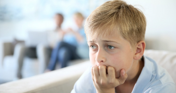 Young boy looking concerned