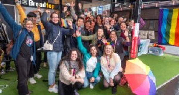 people celebrating IDAHOBIT day in bright colours 