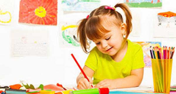 young girl drawing