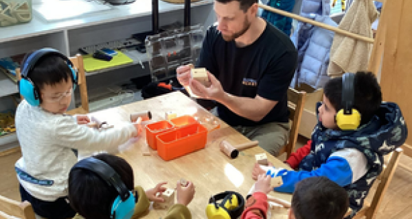 Kids doing woodwork