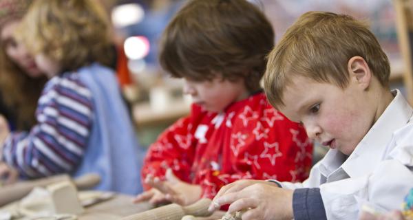 Children making clay