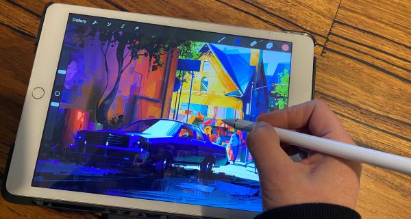 A digital tablet with Procreate artwork 