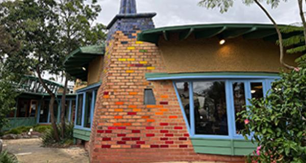 Box Hill Community Arts Centre from the outside with colourful brick chimney