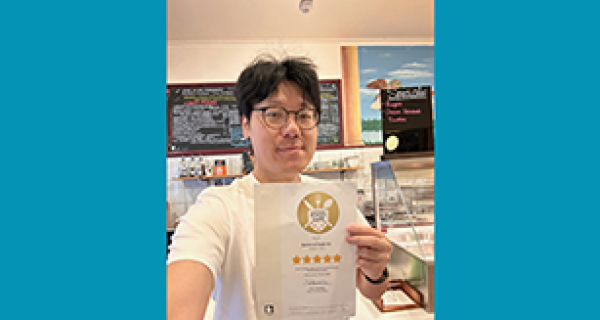 Burwood food for u owner holding their business of the month award