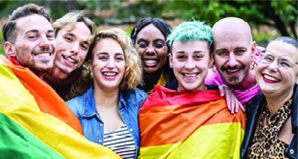 Young people wrapped in Rainbow