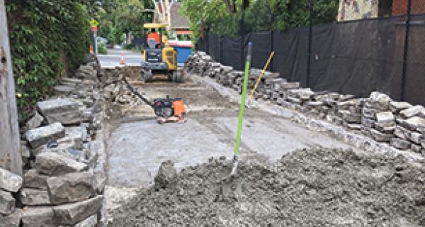 Construction of a road happening with a digger