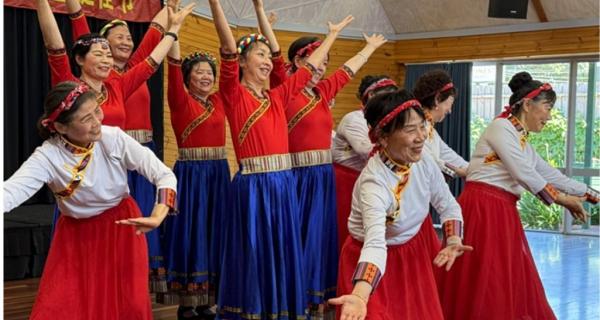 Chinese cultural festival celebration ladies in red blue white traditional costume
