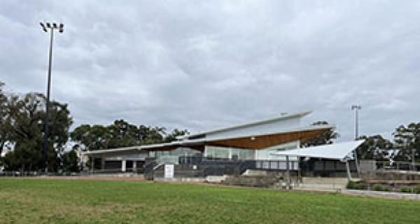 looking at Morton park club rooms with light poles in background