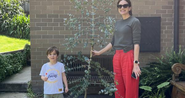 Mum and child with a tree