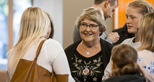 a group of people talking