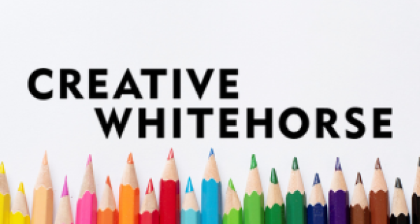 Festivals - CW - CTA.png Creative Whitehorse text with coloured pencils in rainbow order on the bottom of the graphic