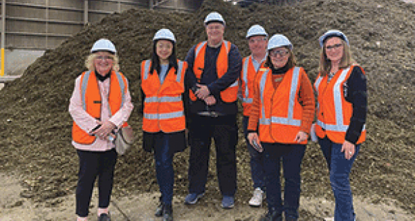 Group at waste facility 