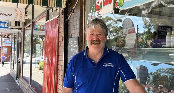 Garry Rush in a blue t-shirt standing at the front GJ Rush Butchers
