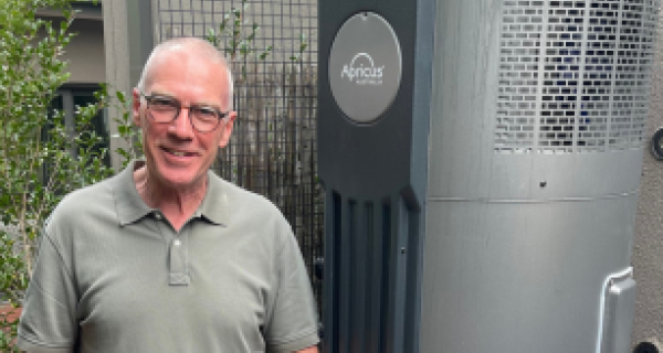 Geoff standing in front of Hot Water Pump