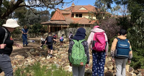photo of children playing on rocks at Strathdon