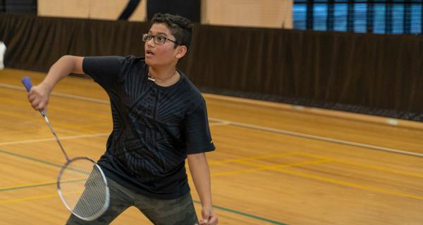 boy playing badminton