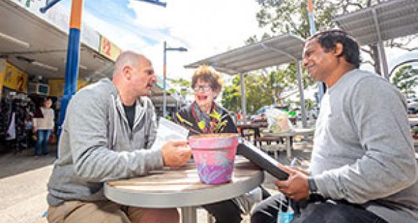 three residents talking