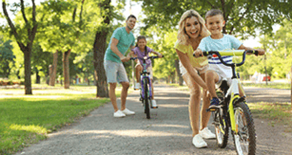 Family riding bikes