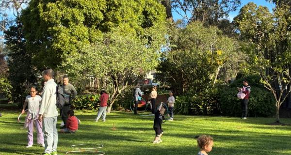 Families playing on the grass