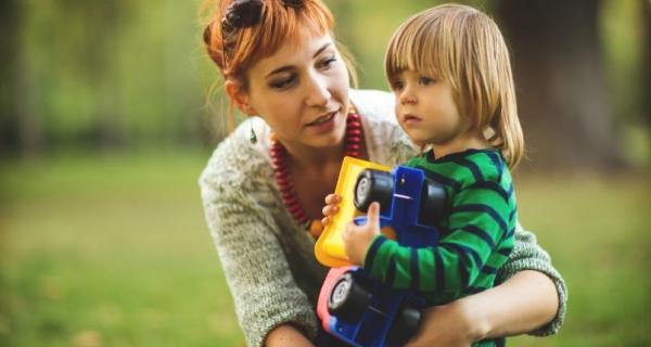 Parent reassuring young child