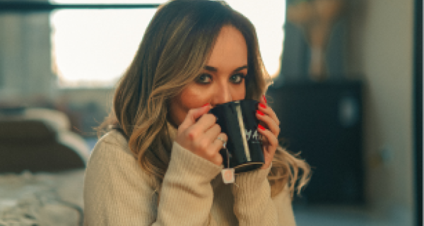 lady holding a cup of tea