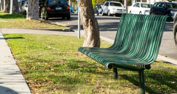 Green bench on the nature strip