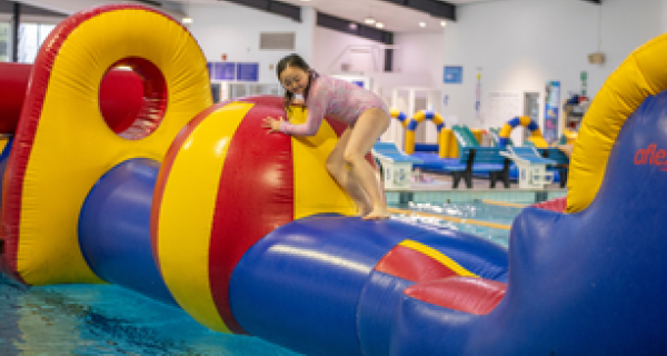 girl in pool inflatable