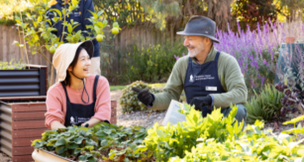 Two gardening volunteers