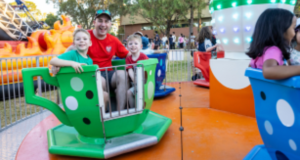 family on ride at spring festival
