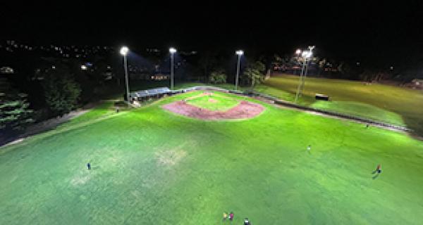 Sports ground at night with flood lights