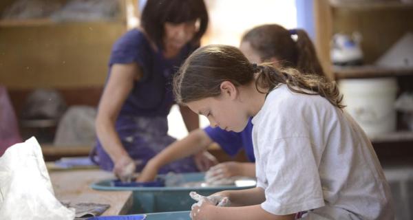 Kids doing pottery