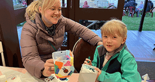 Mother and child making arts and crafts