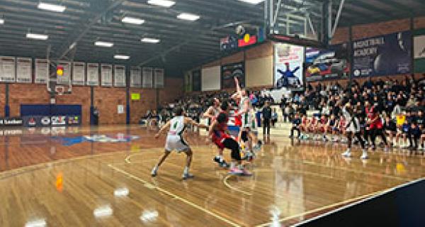 Nunawading indoor basketball court with people playing basketball