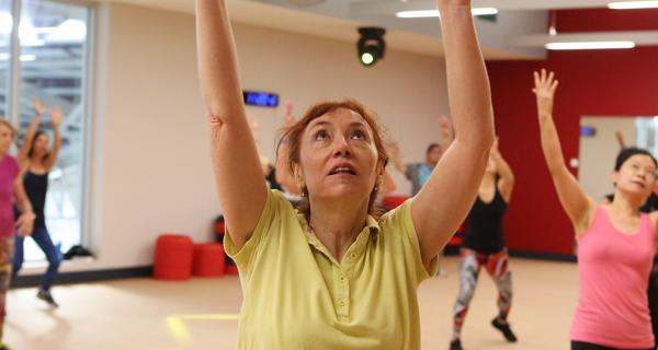 Women doing a group exercise class