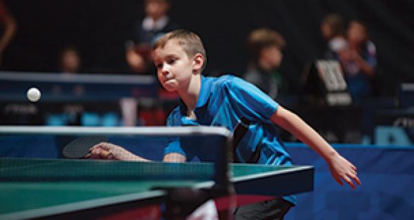 Boy lpaying table tennis