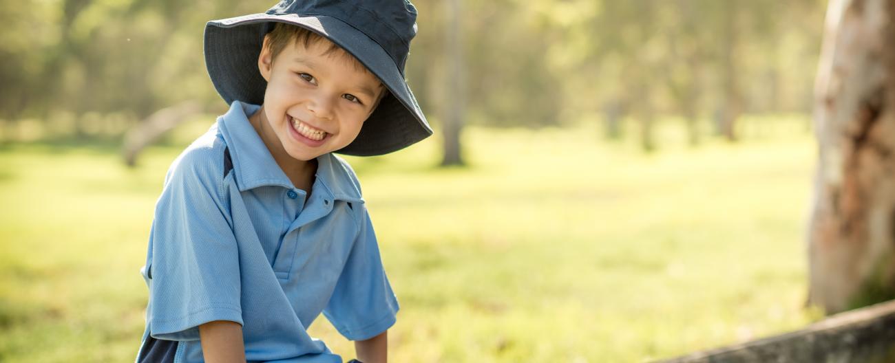 Happy young school child