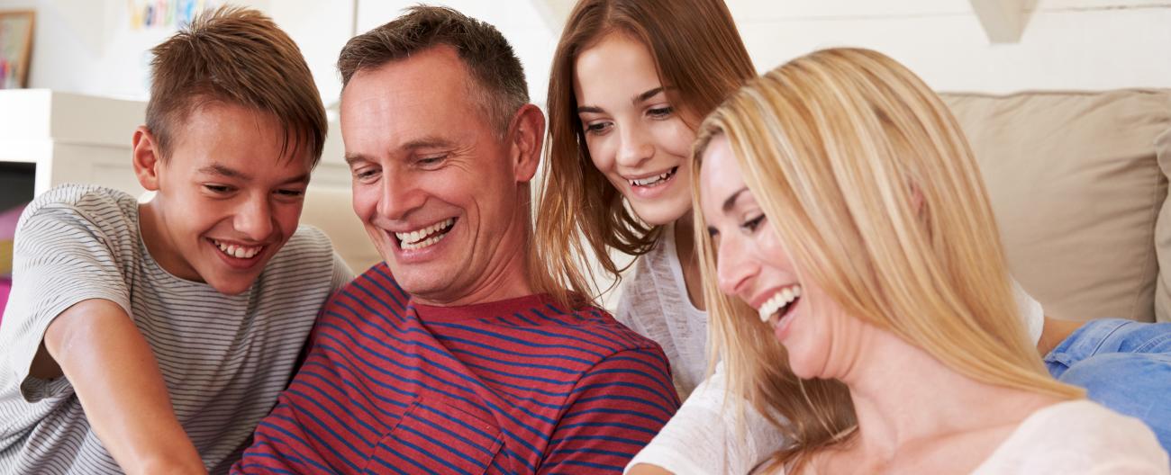 Family with two teenagers enjoying time together