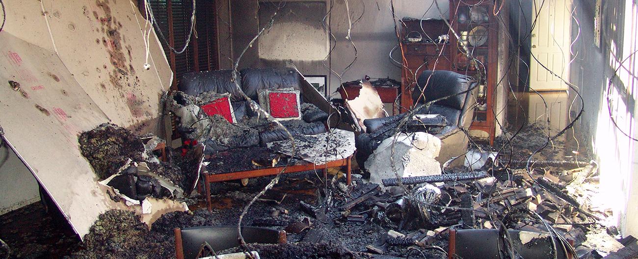 Lounge room damaged by fire