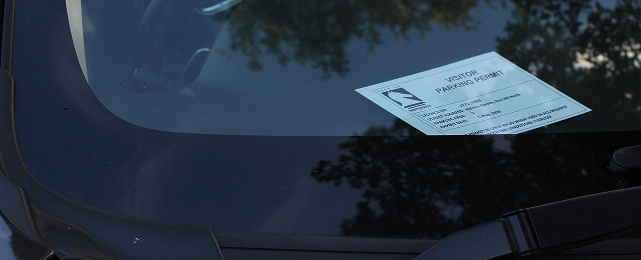 Visitor parking permit in windscreen