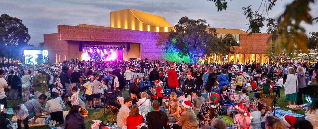 The community celebrating the christmas carols