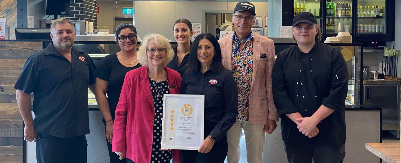 Mayor Denise Massoud with staff at Schnitz Burwood One